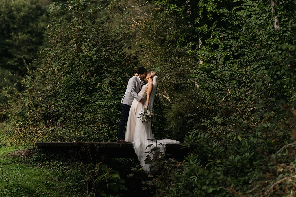 Bride and Groom sharing a moment at Fairyhill Oldwalls Gower
