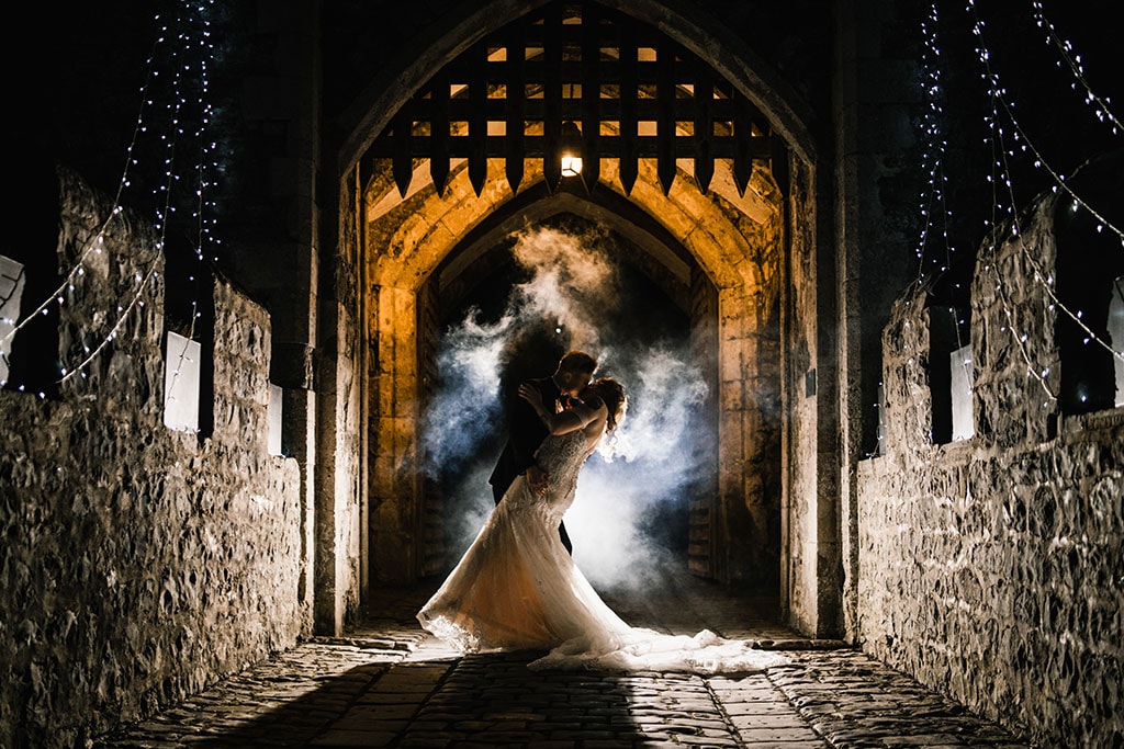Dramatic wedding couple shot at St Donats Castle